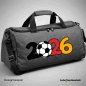 Preview: Plotterdatei 2026 Fußball mit Umrandung schwarz Design auf einen grauen Reisetasche