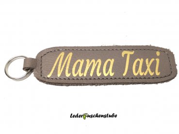 Lederschlüsselanhänger steingrau Text Mama Taxi gold